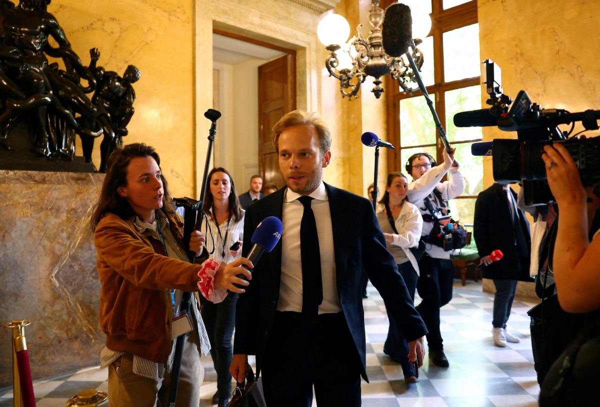 Member of parliament Charles Alloncle, from the UDR (Union des Droites pour la Republique) party and rapporteur of the Commission of Inquiry on Public Broadcasting, is surrounded by journalists as he leaves following the vote by lawmakers on the Parliamentary inquiry into French Public Broadcasting at the National Assembly in Paris, France, April 27, 2026. REUTERS/Abdul Saboor