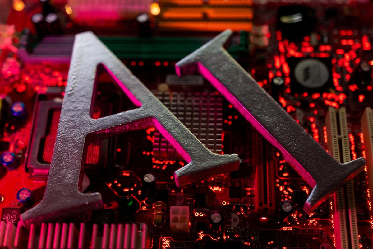 AI (Artificial Intelligence) letters are placed on computer motherboard in this illustration taken, June 23, 2023. REUTERS/Dado Ruvic/Illustration
